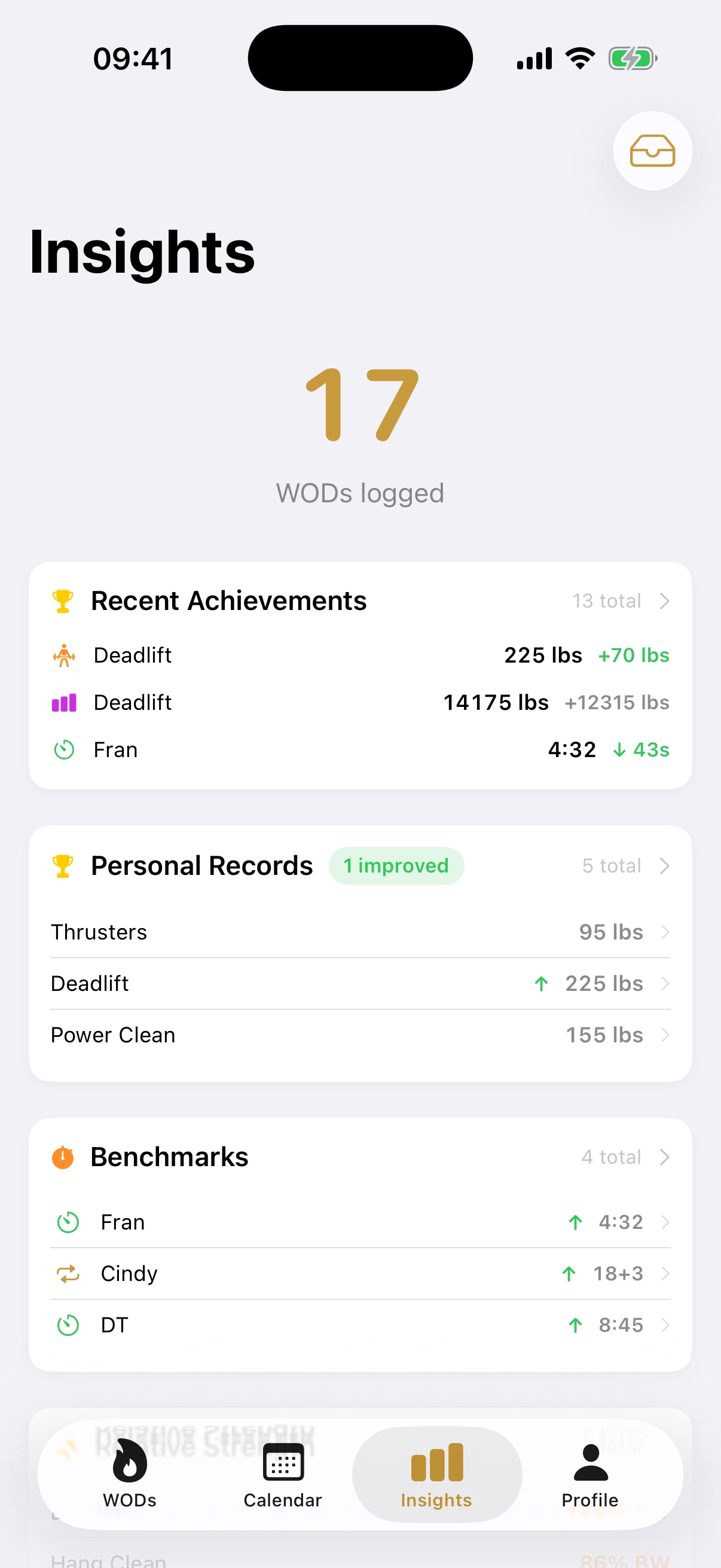 Insights dashboard showing 17 WODs logged, recent achievements, and personal records